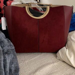 Burgundy faux suede statement bag, gold hardware